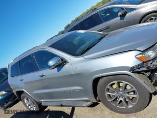 2014 Jeep Grand Cherokee Overland with VIN 1C4RJFCM4EC316142, listed as a IAAI auction lot 40607061 with 195,008 mi miles. Bid and sale history available at carsss.com. Image 12.
