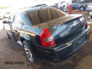 2010 Chrysler 300 Touring with VIN 2C3CA5CV9AH284356, listed as a IAAI auction lot 42124573 with 208,519 mi miles and . Bid and sale history available at DreamBid. Image 3.