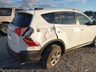 2015 Toyota RAV4 XLE with VIN JTMWFREV4FD069471, listed as a IAAI auction lot 41854384 with 168,663 mi miles. Bid and sale history available at carsss.com. Image 6.