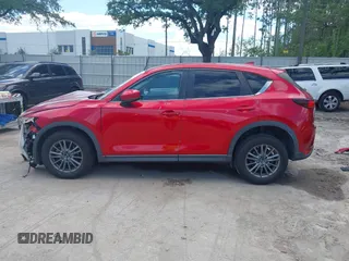 2019 Mazda CX-5 Touring with VIN JM3KFACM6K1549234, listed as a IAAI auction lot 42036633 with 85,065 mi miles and . Bid and sale history available at carsss.com. Image 15.