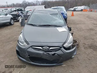 2013 Hyundai Accent SE with VIN KMHCU5AE1DU091931, listed as a IAAI auction lot 41783034 with 72,732 mi miles. Bid and sale history available at carsss.com. Image 12.