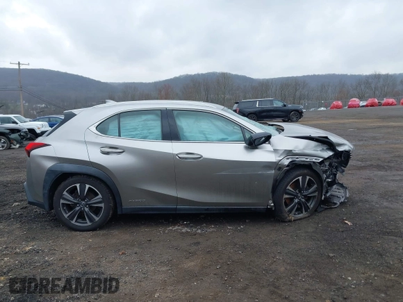 2019 Lexus UX 250h z VIN JTHU9JBH9K2008345, wystawiony jako IAAI lot #42019642 z przebiegiem Nie podano mil oraz . Historia ofert i sprzedaży dostępna na DreamBid. Obrazek 12.