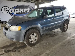 2001 Ford Escape XLT с VIN 1FMYU04121KA69638, выставлен на аукционе Copart как лот 54425385 с пробегом 190 995 миль миль и Списание • Salvage title. История ставок и продаж доступна на DreamBid. Изображение 1.