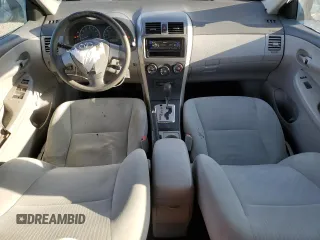 2010 Toyota Corolla with VIN 2T1BU4EE1AC363990, listed as a Copart auction lot 52001595 with 244,000 mi miles and Salvage title. Bid and sale history available at DreamBid. Image 8.