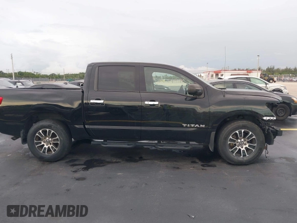 2021 Nissan Titan SV with VIN 1N6AA1EF4MN503458, listed as a IAAI auction lot 42401074 with 53,558 mi miles and . Bid and sale history available at DreamBid. Image 14.