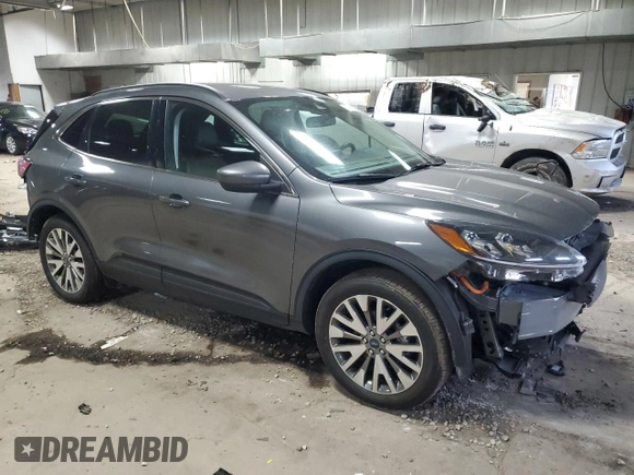 2021 Ford Escape Titanium Hybrid z VIN 1FMCU9DZ8MUA56194, wystawiony jako Copart lot #51427475 z przebiegiem 40 471 mil mil oraz Szkoda całkowita • Salvage title. Historia ofert i sprzedaży dostępna na DreamBid. Obrazek 4.