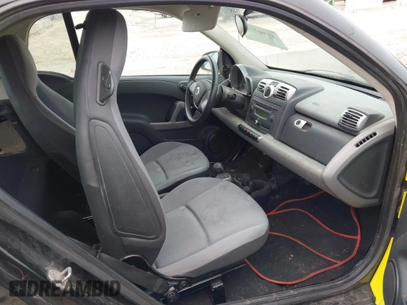 2008 Smart fortwo Pure z VIN WMEEJ31X58K163695, wystawiony jako IAAI lot #41967790 z przebiegiem 133 970 mil mil oraz . Historia ofert i sprzedaży dostępna na DreamBid. Obrazek 5.