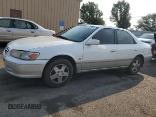 2001 Toyota Camry LE z VIN JT2BF22K010297055, wystawiony jako Copart lot #59510645 z przebiegiem 265 428 mil mil oraz Szkoda całkowita • Salvage title. Historia ofert i sprzedaży dostępna na DreamBid. Obrazek 1.