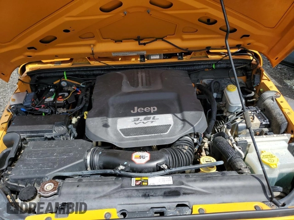 2012 Jeep Wrangler Sport with VIN 1C4AJWAG6CL247929, listed as a Copart auction lot 58942515 with 113,833 mi miles and Salvage title. Bid and sale history available at DreamBid. Image 12.