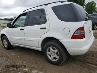 2001 Mercedes-Benz M 320/430/500 with VIN 4JGAB54E51A277087, listed as a Copart auction lot 58258675 with 221,151 mi miles and Salvage title. Bid and sale history available at DreamBid. Image 2.
