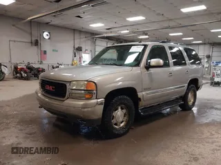 2004 GMC Yukon SLT with VIN 1GKEK13TX4J155865, listed as a IAAI auction lot 41758663 with 281,531 mi miles. Bid and sale history available at carsss.com. Image 2.