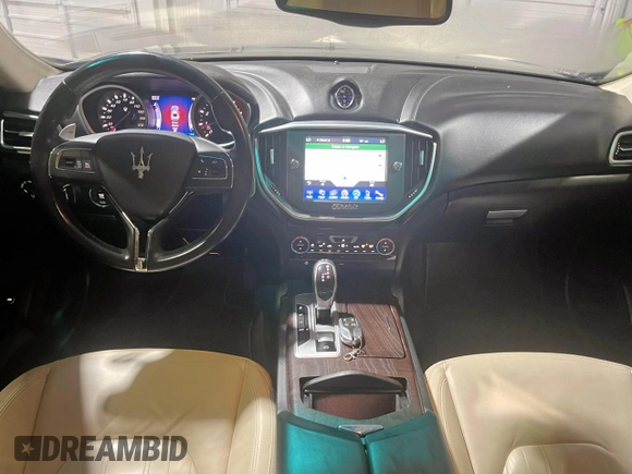 2014 Maserati Ghibli S Q4 z VIN ZAM57RTA9E1112724, wystawiony jako Copart lot #57189295 z przebiegiem 45 525 mil mil oraz Szkody całkowita. Historia ofert i sprzedaży dostępna na DreamBid. Obrazek 9.