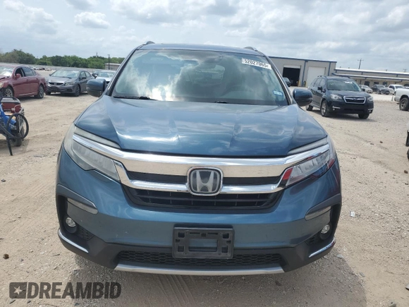 2019 Honda Pilot Touring 7-Passenger z VIN 5FNYF5H63KB037250, wystawiony jako Copart lot #52027065 z przebiegiem 95 693 mil mil oraz Szkoda całkowita • Salvage title. Historia ofert i sprzedaży dostępna na DreamBid. Obrazek 5.