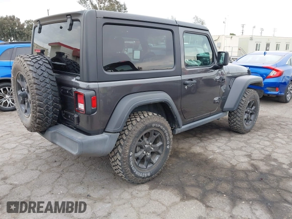 2022 Jeep Wrangler Willys Sport with VIN 1C4GJXAN7NW252931, listed as a IAAI auction lot 40972143 with 12,823 mi miles and . Bid and sale history available at DreamBid. Image 4.