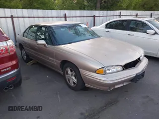 1998 Pontiac Bonneville SE z VIN 1G2HX52K4W4237591, wystawiony jako IAAI lot #42728826 z przebiegiem 205 029 mil mil oraz . Historia ofert i sprzedaży dostępna na DreamBid. Obrazek 1.
