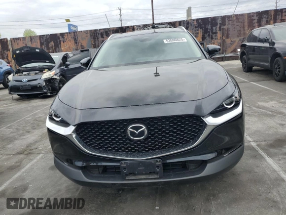 2024 Mazda CX-30 S Carbon Edition z VIN 3MVDMBCM1RM618954, wystawiony jako Copart lot #53690825 z przebiegiem 16 776 mil mil oraz Szkoda całkowita • Salvage title. Historia ofert i sprzedaży dostępna na DreamBid. Obrazek 5.