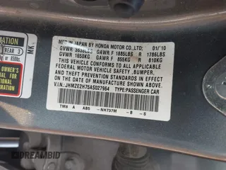 2010 Honda Insight EX with VIN JHMZE2H75AS027964, listed as a IAAI auction lot 41889301 with 136,485 mi miles and . Bid and sale history available at DreamBid. Image 9.