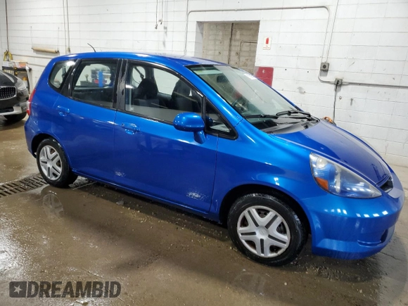 2007 Honda Fit with VIN JHMGD37447S041337, listed as a Copart auction lot 60352955 with 222,726 mi miles and Clean title. Bid and sale history available at DreamBid. Image 4.