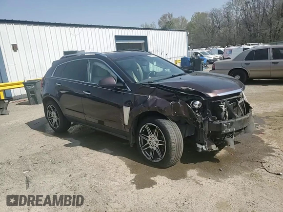 2015 Cadillac SRX Performance Collection z VIN 3GYFNCE30FS533686, wystawiony jako Copart lot #49820745 z przebiegiem 134 363 mil mil oraz Szkoda całkowita • Salvage title. Historia ofert i sprzedaży dostępna na DreamBid. Obrazek 15.