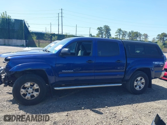 2014 Toyota Tacoma with VIN 3TMLU4EN4EM154261, listed as a IAAI auction lot 42119237 with 211,929 mi miles and . Bid and sale history available at DreamBid. Image 15.
