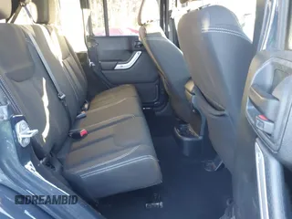 2017 Jeep Wrangler Unlimited Sahara with VIN 1C4BJWEGXHL686766, listed as a IAAI auction lot 41305319 with 97,806 mi miles. Bid and sale history available at carsss.com. Image 8.