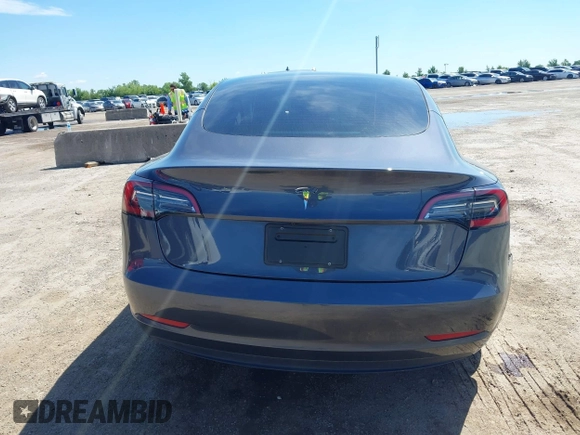 2023 Tesla Model 3 with VIN 5YJ3E1EAXPF617388, listed as a IAAI auction lot 42218748 with Not provided miles and . Bid and sale history available at DreamBid. Image 16.