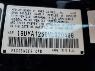 1997 Acura CL z VIN 19UYA1256VL020498, wystawiony jako Copart lot #77040994 z przebiegiem 202 124 mil mil oraz Czysty tytuł • Clean title. Historia ofert i sprzedaży dostępna na DreamBid. Obrazek 12.