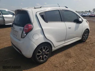 2015 Chevrolet Spark LT with VIN KL8CF6S99FC702215, listed as a Copart auction lot 60827654 with 134,050 mi miles and Salvage Title. Bid and sale history available at carsss.com. Image 3.