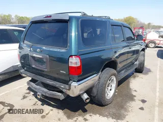 1998 Toyota 4Runner SR5 with VIN JT3HN86R3W0170519, listed as a IAAI auction lot 41894136 with 185,261 mi miles and . Bid and sale history available at DreamBid. Image 4.