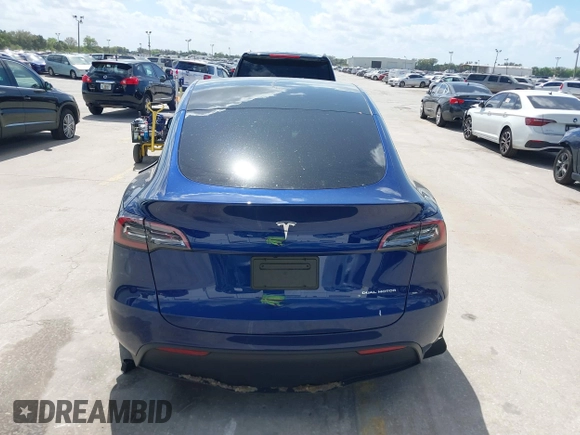 2023 Tesla Model Y Long Range with VIN 7SAYGDEE9PA205757, listed as a IAAI auction lot 41705881 with 18,567 mi miles and . Bid and sale history available at carsss.com. Image 16.