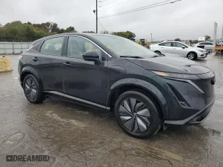 2023 Nissan ARIYA PREMIERE with VIN JN1BF0BAXPM409934, listed as a Copart auction lot 72105504 with 5,210 mi miles and Salvage Title. Bid and sale history available at carsss.com. Image 4.