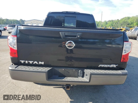 2017 Nissan Titan Platinum Reserve with VIN 1N6AA1E53HN569660, listed as a Copart auction lot 54409625 with 98,858 mi miles and Salvage title. Bid and sale history available at DreamBid. Image 6.