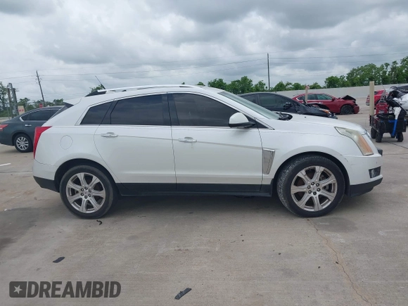 2014 Cadillac SRX Premium Collection with VIN 3GYFNDE31ES615995, listed as a IAAI auction lot 42148943 with 232,752 mi miles and . Bid and sale history available at DreamBid. Image 13.