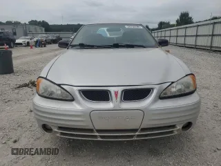2001 Pontiac Grand Am with VIN 1G2NE12TX1M668035, listed as a Copart auction lot 59700585 with 60,965 mi miles and Salvage title. Bid and sale history available at DreamBid. Image 5.