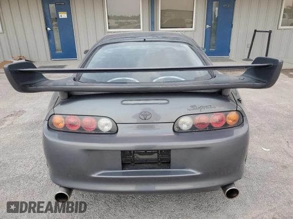 1996 Toyota Supra с VIN JZA800034162, выставлен на аукционе Copart как лот 80046394 с пробегом 86 285 миль миль и Чистый • Clean title. История ставок и продаж доступна на DreamBid. Изображение 6.