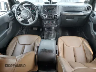 2013 Jeep Wrangler Unlimited Sahara with VIN 1C4BJWEG8DL584909, listed as a Copart auction lot 58520555 with 91,633 mi miles and Salvage title. Bid and sale history available at DreamBid. Image 8.