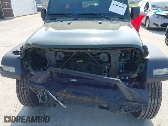 2023 Jeep Wrangler Willys with VIN 1C4HJXDG7PW646627, listed as a IAAI auction lot 42469601 with 50,178 mi miles and . Bid and sale history available at DreamBid. Image 6.