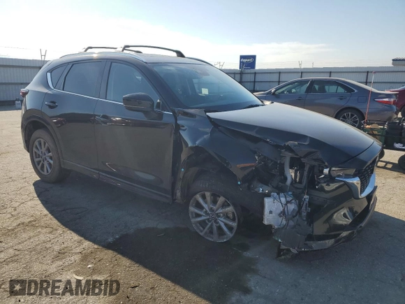 2024 Mazda CX-5 2.5 S Preferred Package with VIN JM3KFBCL3R0475493, listed as a Copart auction lot 50328625 with 8,568 mi miles and Salvage Title. Bid and sale history available at carsss.com. Image 4.