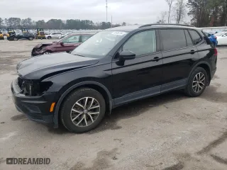 2021 Volkswagen Tiguan S with VIN 3VV1B7AX2MM017521, listed as a Copart auction lot 85606784 with 92,075 mi miles and Salvage Title. Bid and sale history available at carsss.com. Image 1.