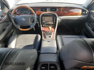 2005 Jaguar XJ Vanden Plas with VIN SAJWA82B05TG47030, listed as a Copart auction lot 41040574 with 114,520 mi miles and Salvage Title. Bid and sale history available at carsss.com. Image 8.