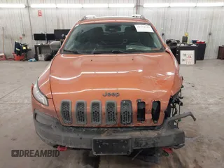 2015 Jeep Cherokee Trailhawk with VIN 1C4PJMBS5FW524462, listed as a IAAI auction lot 41774347 with 107,592 mi miles. Bid and sale history available at carsss.com. Image 13.
