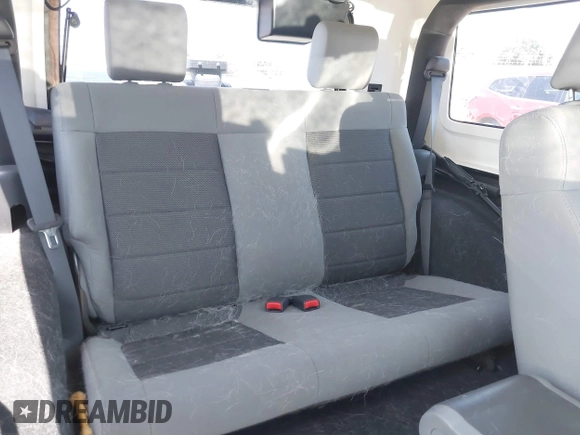 2008 Jeep Wrangler X with VIN 1J4FA24178L517113, listed as a IAAI auction lot 42347046 with 89,954 mi miles and . Bid and sale history available at DreamBid. Image 8.