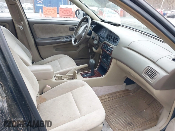 1999 Nissan Altima XE with VIN 1N4DL01DXXC148729, listed as a IAAI auction lot 41697641 with 187,596 mi miles. Bid and sale history available at carsss.com. Image 5.