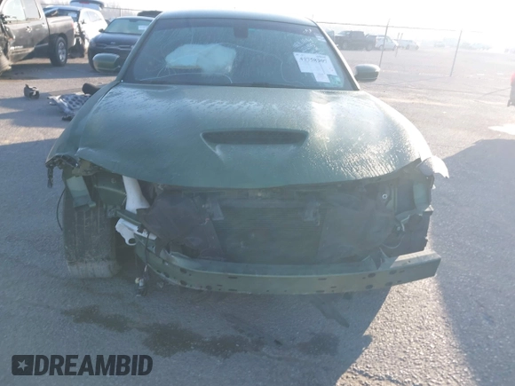 2022 Dodge Charger R/T with VIN 2C3CDXCT6NH202445, listed as a IAAI auction lot 41758307 with 65,077 mi miles and . Bid and sale history available at DreamBid. Image 6.