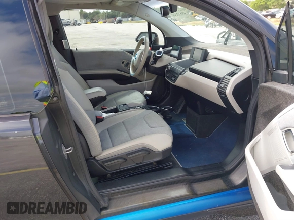 2014 BMW i3 z VIN WBY1Z4C56EVX63285, wystawiony jako IAAI lot #41672245 z przebiegiem 70 229 mil mil oraz . Historia ofert i sprzedaży dostępna na DreamBid. Obrazek 5.