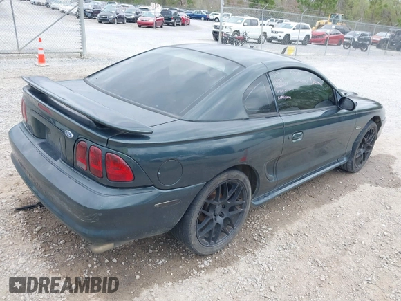 1998 Ford Mustang GT with VIN 1FAFP42X0WF234934, listed as a IAAI auction lot 41789646 with 250,864 mi miles and . Bid and sale history available at DreamBid. Image 4.