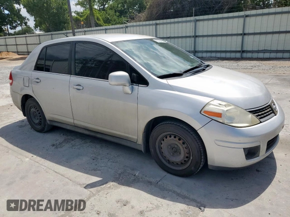 2009 Nissan Versa S with VIN 3N1BC11E39L376873, listed as a Copart auction lot 60299465 with 134,769 mi miles and Salvage title. Bid and sale history available at DreamBid. Image 4.