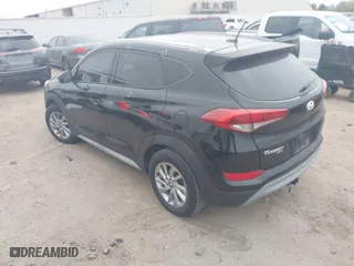 2017 Hyundai Tucson Value with VIN KM8J33A27HU388910, listed as a IAAI auction lot 41101112 with 107,138 mi miles. Bid and sale history available at carsss.com. Image 3.
