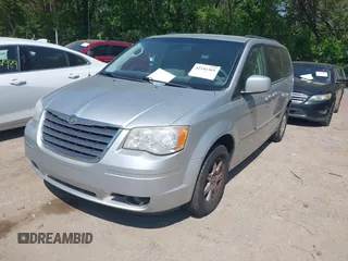 2008 Chrysler Town & Country Touring with VIN 2A8HR54P18R777245, listed as a IAAI auction lot 42241365 with 149,478 mi miles and . Bid and sale history available at DreamBid. Image 2.