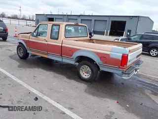 1994 Ford F-150 with VIN 1FTEX15NXRKB25889, listed as a IAAI auction lot 41031876 with 201,211 mi miles. Bid and sale history available at carsss.com. Image 3.